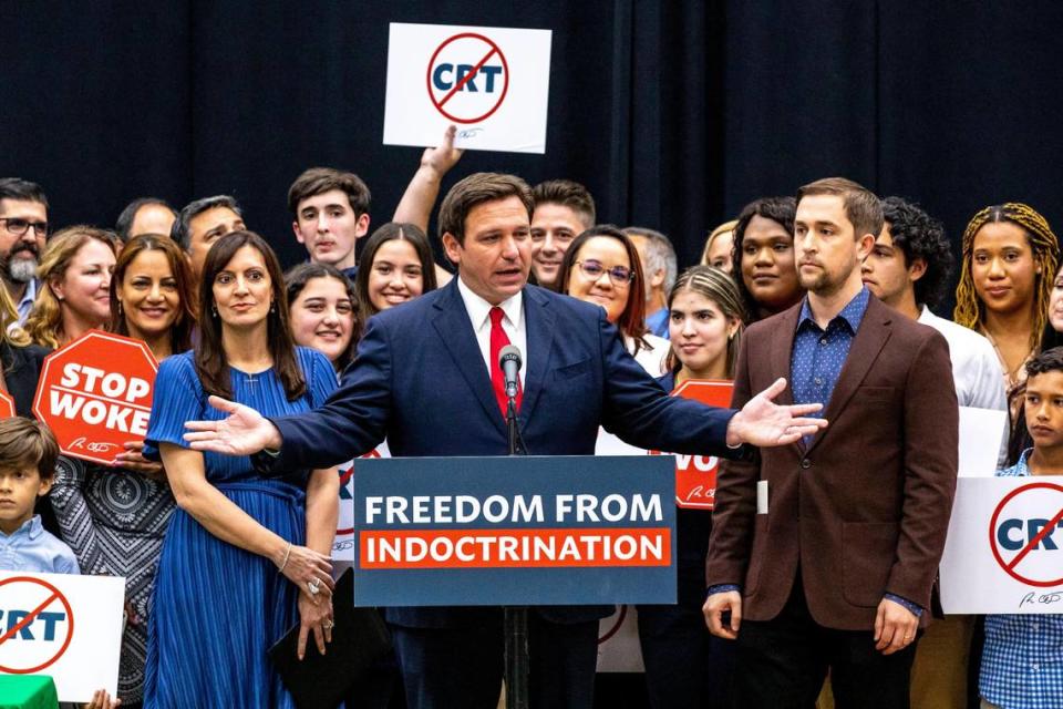 Florida Gov. Ron DeSantis addresses the crowd before signing HB 7, titled ‘Individual Freedom’ and also dubbed the ‘Stop Woke Act,’ during a press conference at Mater Academy Charter Middle/High School in Hialeah Gardens, Florida, on Friday, April 22, 2022. DeSantis also signed two other bills into laws, including a measure that would strip six special districts, including the Reedy Creek Improvement District where Walt Disney World is located, of their governmental powers, and one amending the “big tech” bill signed last year.