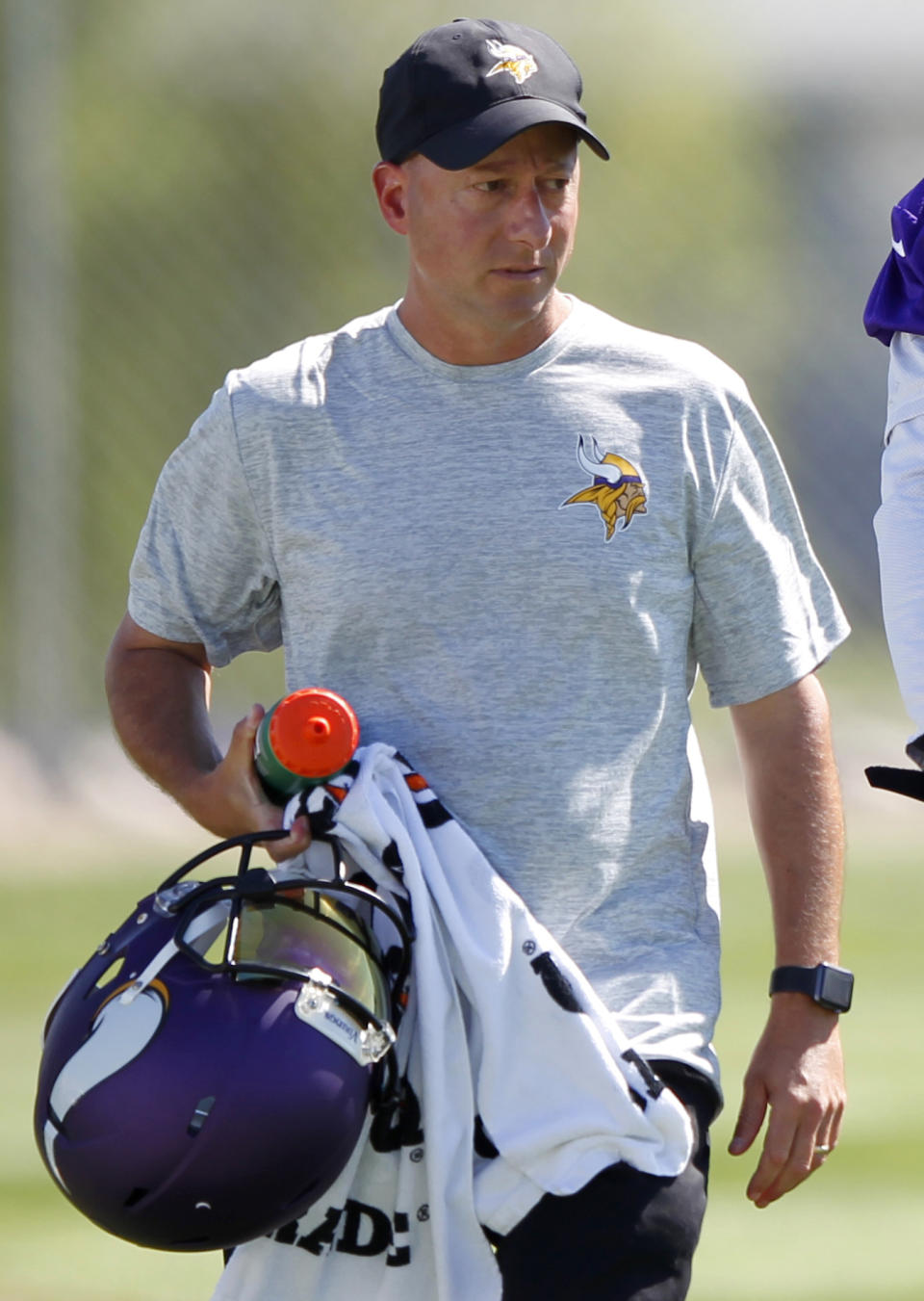 FILE - In this July, 29, 2016, file photo, Minnesota Vikings trainer Eric Sugarman walks off the field during the first day of the NFL football team's training camp at Mankato State University in Mankato, Minn. Documents unsealed in a lawsuit by 1,800 former NFL players provide a behind-the-scenes glimpse at how team and league medical personnel distributed powerful painkillers to players. According to a Jan. 17, 2008 e-mail from Sugarman to team doctors and medical personnel, that was unsealed Friday, March 10, 2017, medications like Ambien, a sedative, and Toradol, a post-surgical painkiller, were distributed to players and not accurately tracked by the team’s dispensing records. An NFL spokesman said, “clubs and their medical staffs are all in compliance with the Controlled Substances Act. ... Any claim or suggestion to the contrary is simply wrong.” (AP Photo/Andy Clayton-King, File)