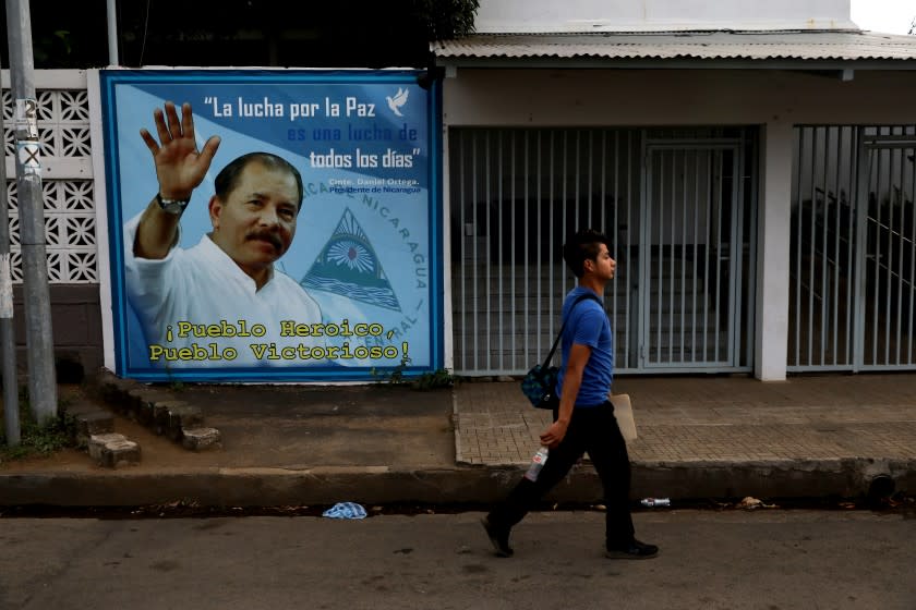 MANAGUA, NICARAGUA -- MONDAY, FEBRUARY 10, 2020: Daniel Ortega, President of Nicaragua since 2007, mural at the Minister of Agriculture building in Nicaragua on Feb. 10, 2020. For 75-months President Daniel Ortega's autocratic regime had been holding up in General Directorate of Customs (DGA) roughly half a million dollars of La Prensa's, in publication for 93-years, two most essential ingredients: paper and ink. (Gary Coronado / Los Angeles Times)