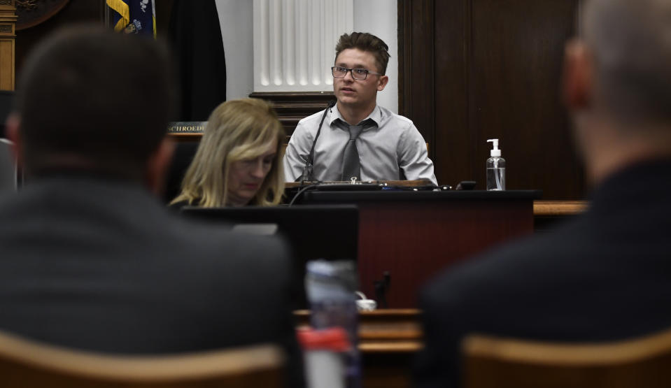 FILE - Dominick Black testifies in the Kyle Rittenhouse trial at the Kenosha County Courthouse in Kenosha, Wis, on Nov. 2, 2021. Black, who bought an AR-15-style rifle for Kyle Rittenhouse has pleaded no contest to a reduced charge of contributing to the delinquency of a minor in a deal with prosecutors to avoid prison. A Wisconsin judge accepted Black's plea on Monday, Jan. 10, 2022. (Sean Krajacic/The Kenosha News via AP, Pool File)