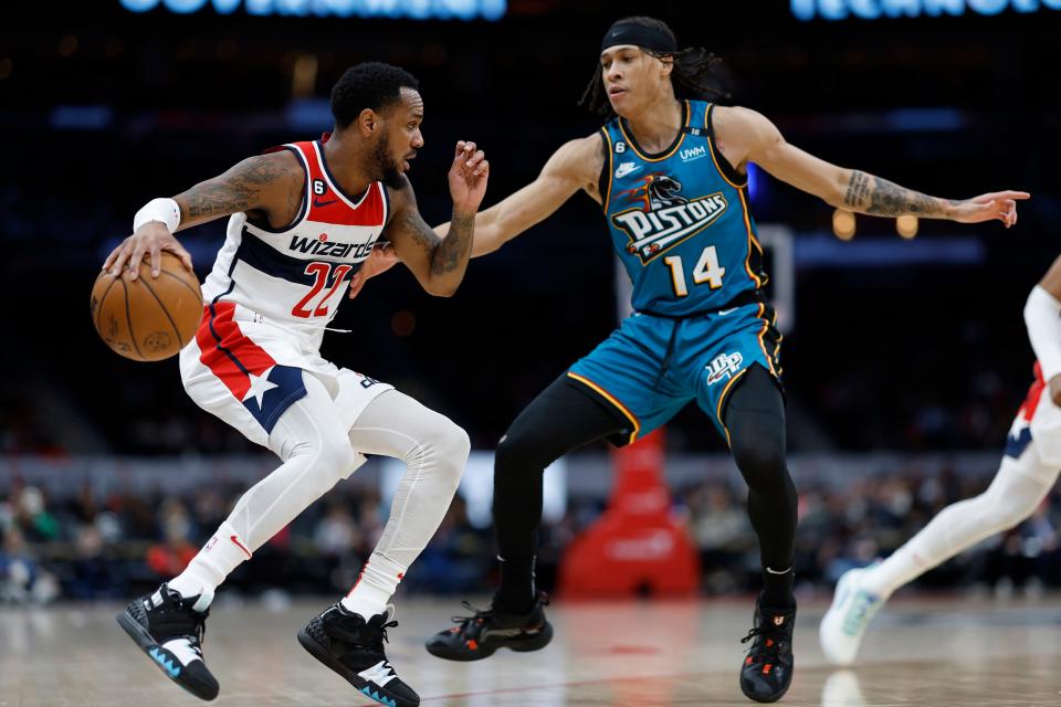 Wizards guard Monte Morris dribbles the ball as Pistons guard R.J. Hampton defends in the third quarter of the Pistons' 117-97 loss to the Wizards on Tuesday, March 14, 2023, in Washington.