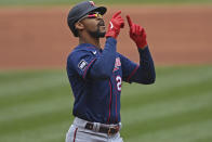 Minnesota Twins' Byron Buxton (25) celebrates after hitting a solo home run off Cleveland Indians starting pitcher Logan Allen in the first inning of a baseball game, Wednesday, April 28, 2021, in Cleveland. (AP Photo/David Dermer)