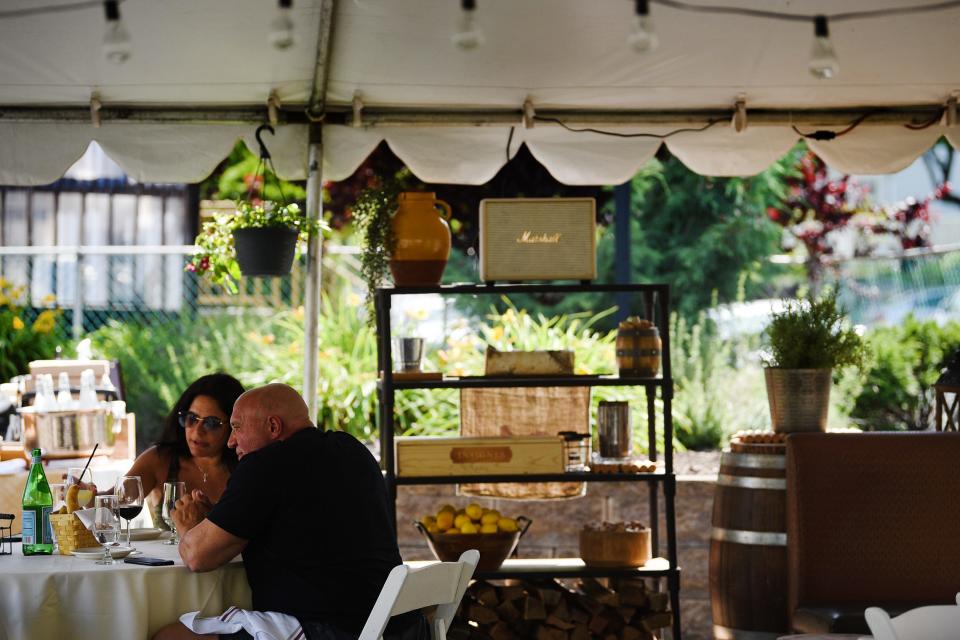 Customers enjoy outdoor dining at the Vesta Wood Fired Pizza in East Rutherford, Tuesday on 06/16/20.  