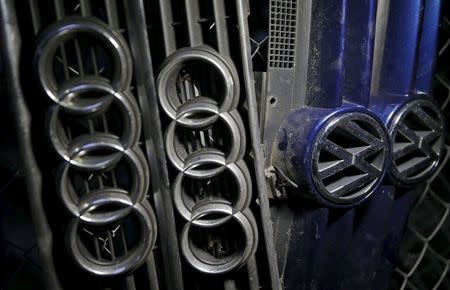 Volkswagen and Audi hood masks are seen in Jelah, Bosnia and Herzegovina, in this September 29, 2015 picture illustration. REUTERS/Dado Ruvic