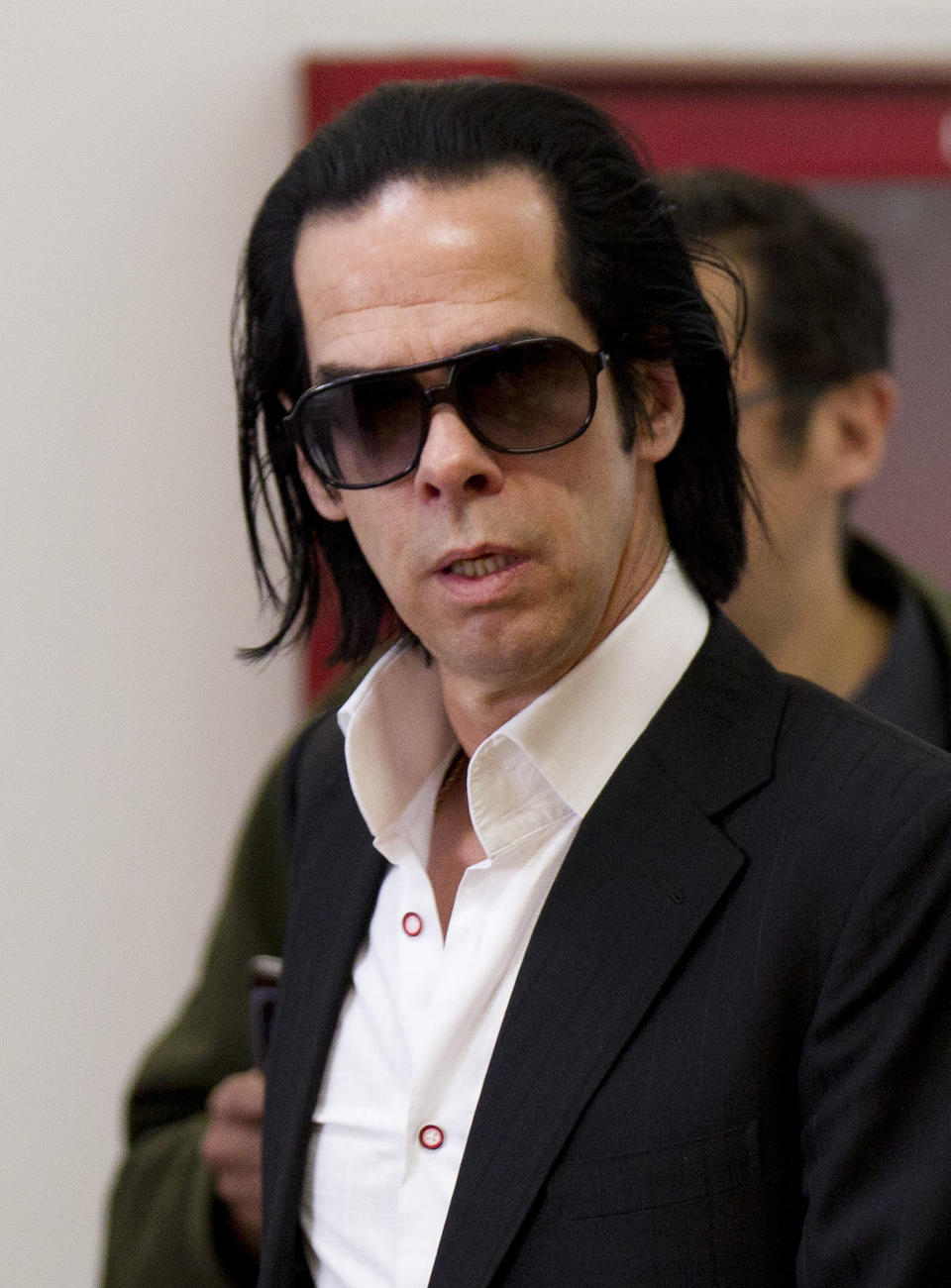 Australian musician and screenwriter Nick Cave arrives for a photo call to promote his new album, 'Push the Sky Away,' in Mexico City, Monday, Feb. 18, 2013. Cave is scheduled to give two concert performances in Mexico City. (AP Photo/Eduardo Verdugo)