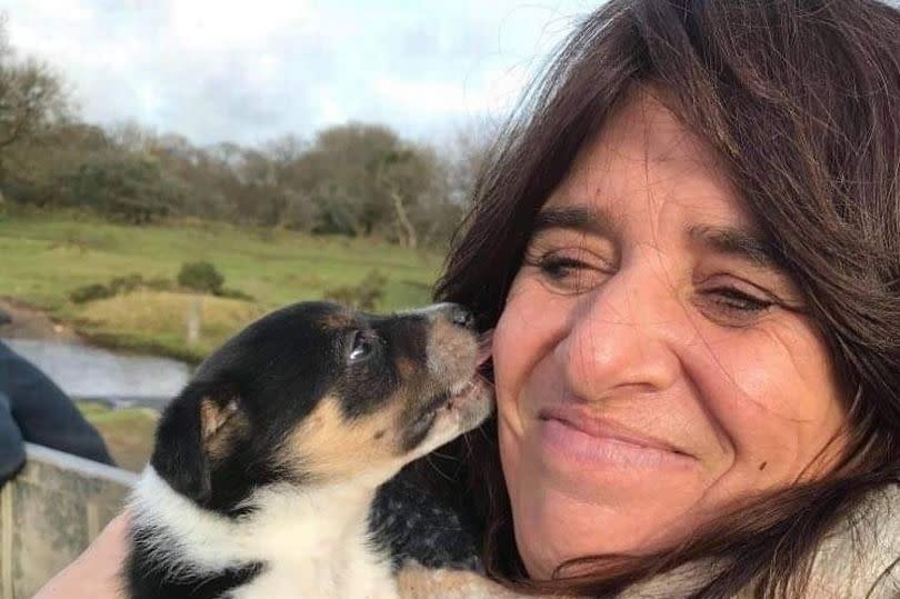 Teacher Samantha Cartmill with her puppy