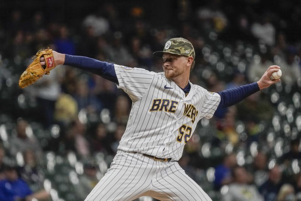 Milwaukee Brewers' Eric Lauer throws during the fourth inning of a baseball game against the Atlanta Braves Friday, May 14, 2021, in Milwaukee. (AP Photo/Morry Gash)