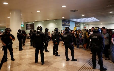 Protesters block access from metro gateway to the airport due to a verdict in a trial over a banned independence referendum, in Barcelona