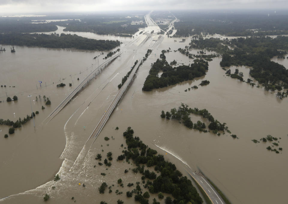 <p>Interstate 69 is covered by floodwaters from Tropical Storm Harvey Tuesday, Aug. 29, 2017, in Humble, Texas. (Photo: David J. Phillip/AP) </p>