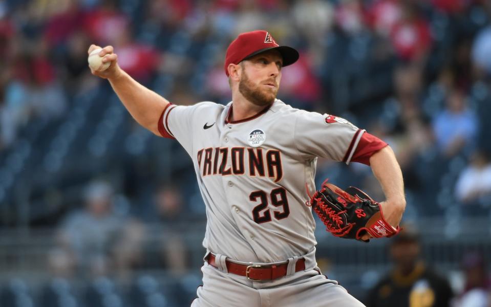 PITTSBURGH, PA - JUNE 03: Merrill Kelly #29 of the Arizona Diamondbacks delivers a pitch in the first inning against the Pittsburgh Pirates at PNC Park on June 3, 2022, in Pittsburgh, Pennsylvania.