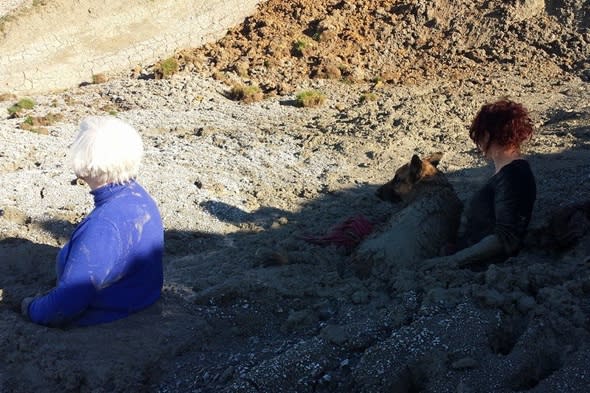 two-women-dog-rescued-waist-deep-mud-herne-bay-beach-kent