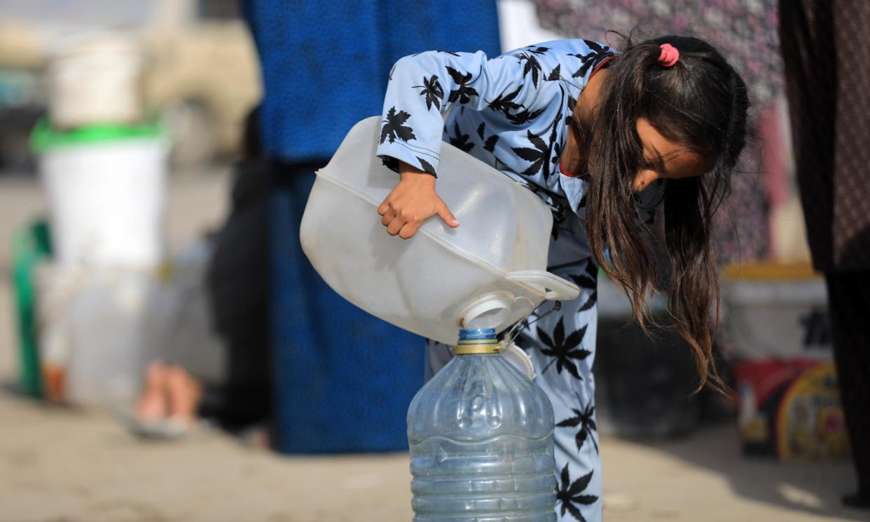 <span>The UN world water development report found that women and girls are often responsible for water collection – and water access is a key issue in the conflict in Gaza.</span><span>Photograph: Anadolu/Getty Images</span>