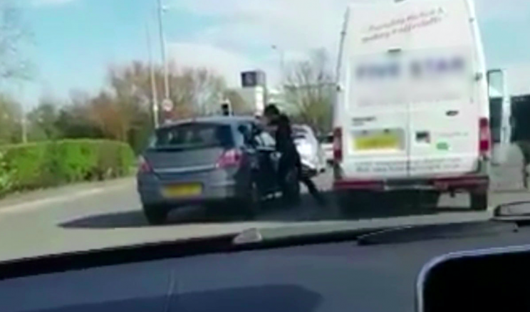 The white van passenger punched the Astra driver several times (SWNS)