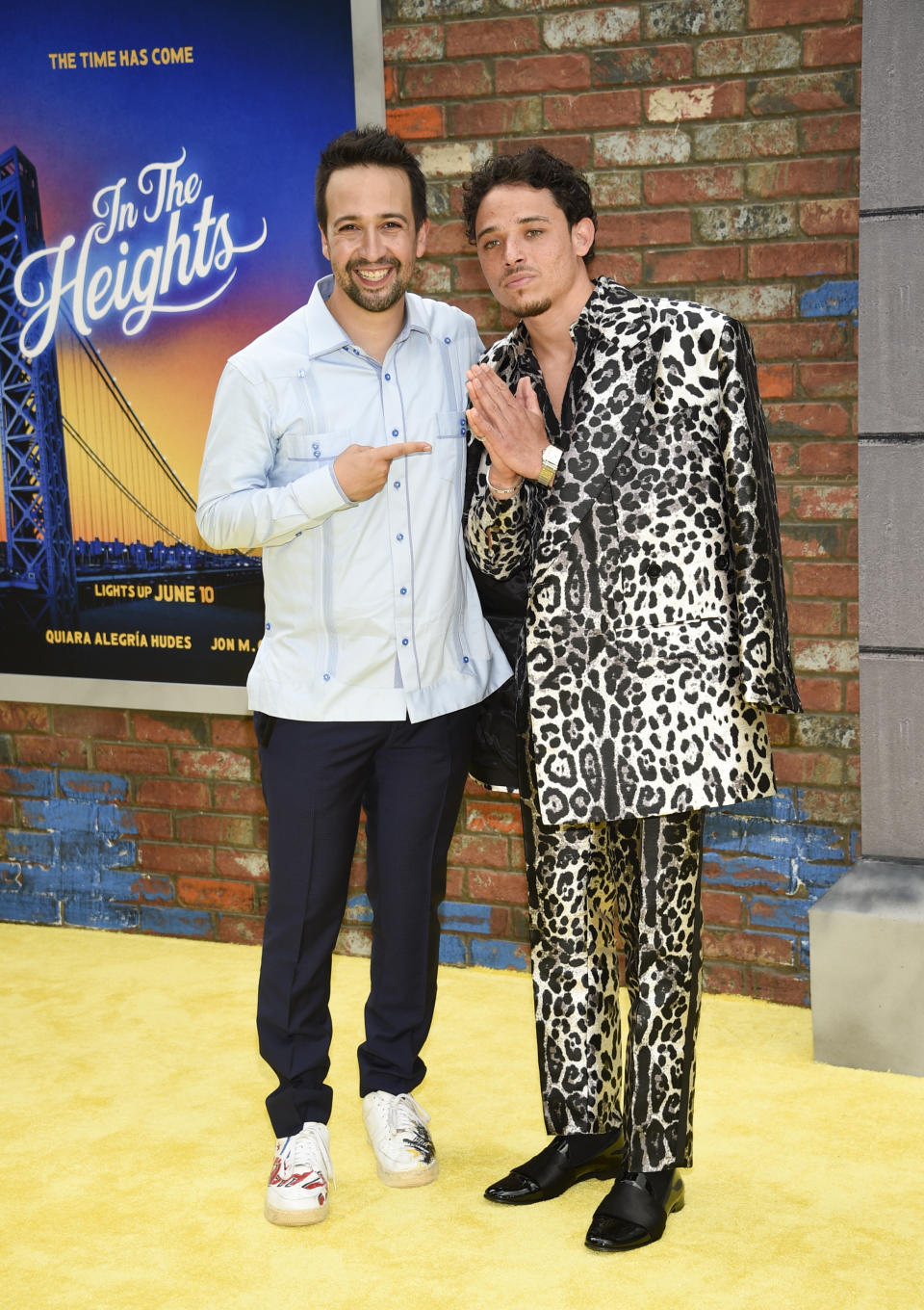 Producer Lin-Manuel Miranda, left, and actor Anthony Ramos pose together at the 2021 Tribeca Film Festival opening night premiere of "In The Heights" at the United Palace theater on Wednesday, June 9, 2021, in New York. (Photo by Evan Agostini/Invision/AP)