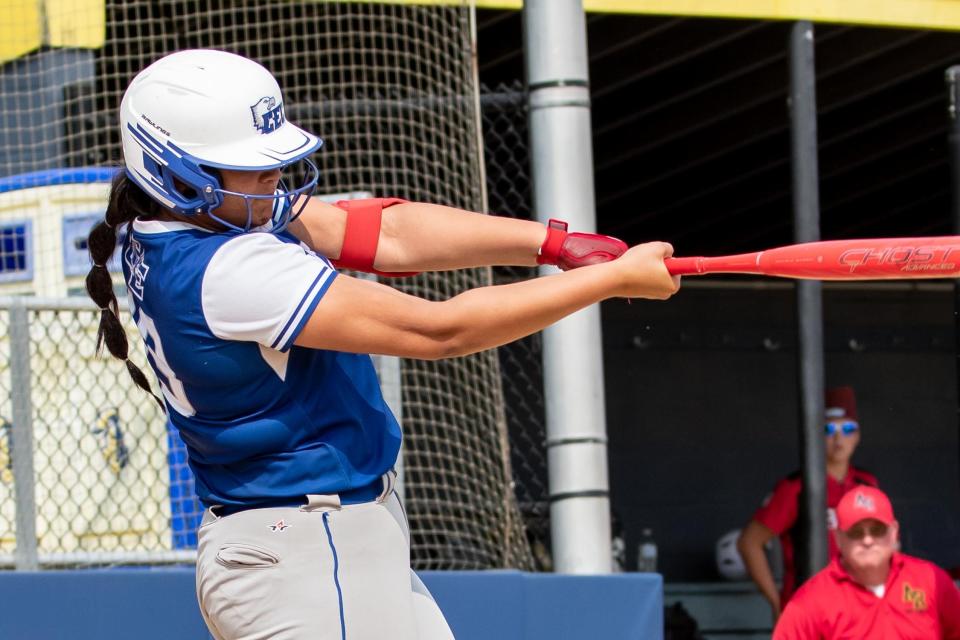 Conwell-Egan's Amariah McKnight hits a two-run single in the Philadelphia Catholic League softball championship game against Archbishop Ryan at Neumann University in Aston on Monday, May 22, 2023. The Eagles defeated the Ragdolls 6-3 for the PCL title.