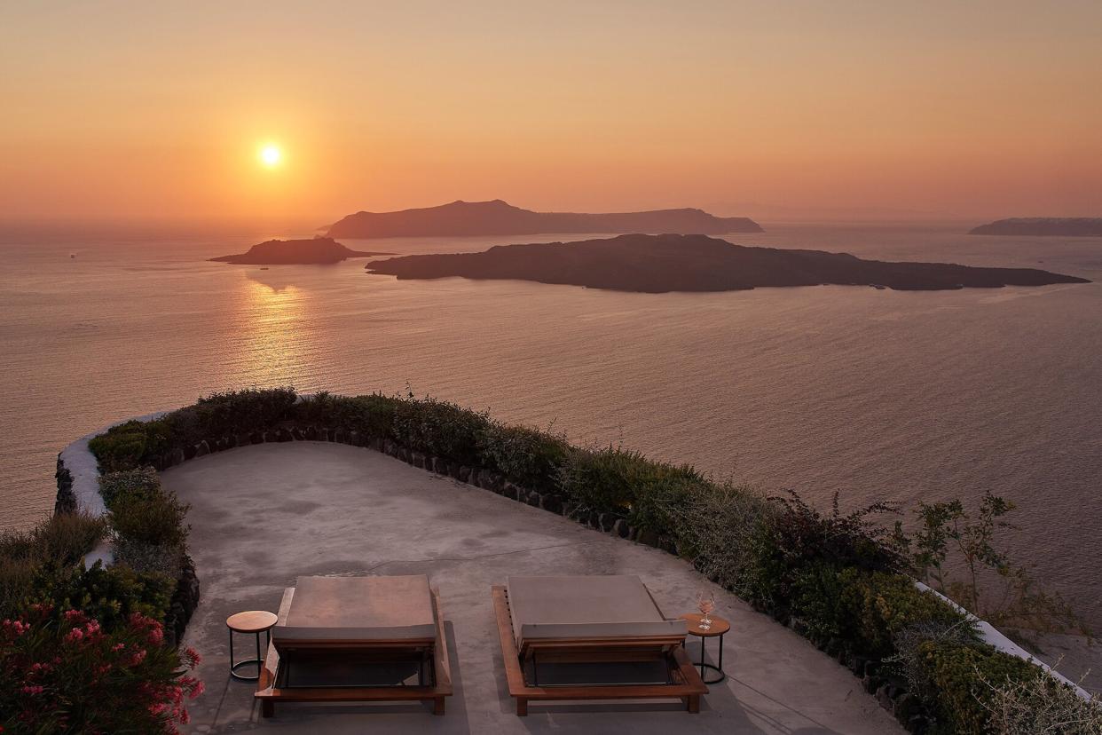 Lounge chairs overlooking the sea at Nafsika Villa in Megalohori, Santorini Greece