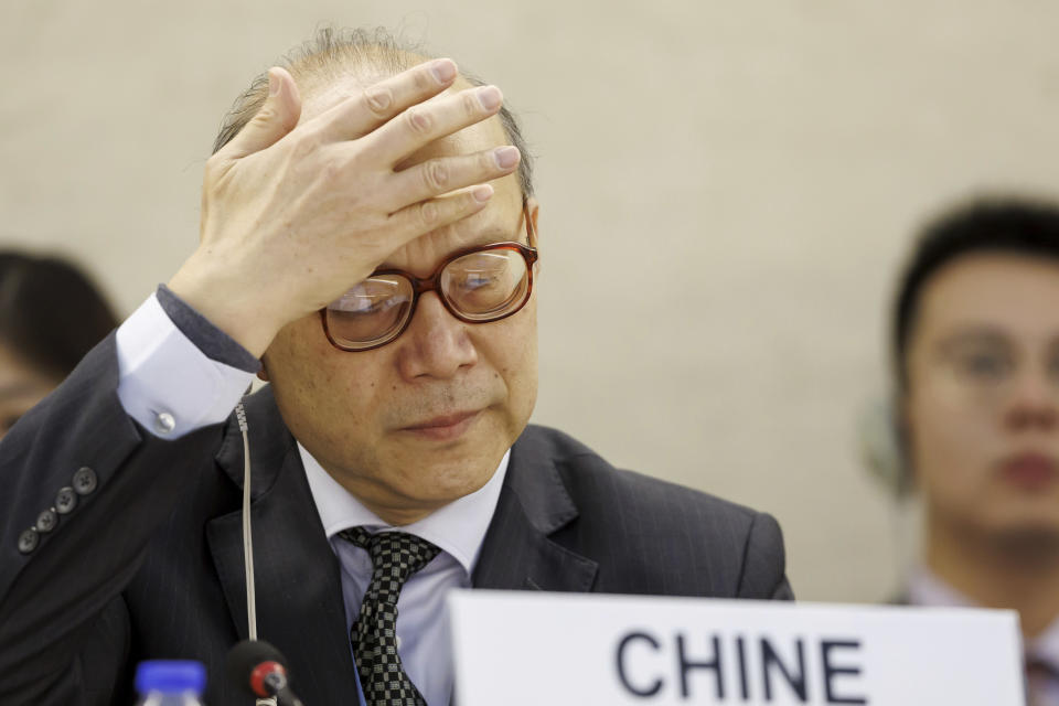 Chen Xu, Ambassador of the Permanent Representative Mission of the China to the UN Geneva, who is leading China's delegation, gestures, during the U.N. Human Rights Council's Universal Periodic Review (UPR) Working Group meeting to review China's human rights record, at the European headquarters of the United Nations in Geneva, Switzerland, Tuesday, Jan. 23, 2024. (Salvatore Di Nolfi/Keystone via AP)