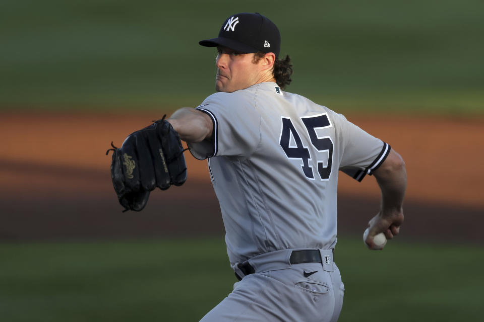 New York Yankees starting pitcher Gerrit Cole throws against the Toronto Blue Jays during the first inning of a baseball game Monday, April 12, 2021, in Dunedin, Fla. (AP Photo/Mike Carlson)