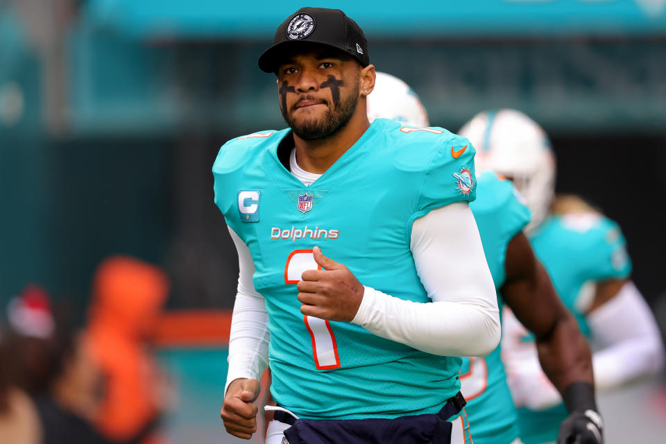 MIAMI GARDENS, FLORIDA - DECEMBER 25: Tua Tagovailoa #1 of the Miami Dolphins takes the field prior to a game against the Green Bay Packers at Hard Rock Stadium on December 25, 2022 in Miami Gardens, Florida. (Photo by Megan Briggs/Getty Images)