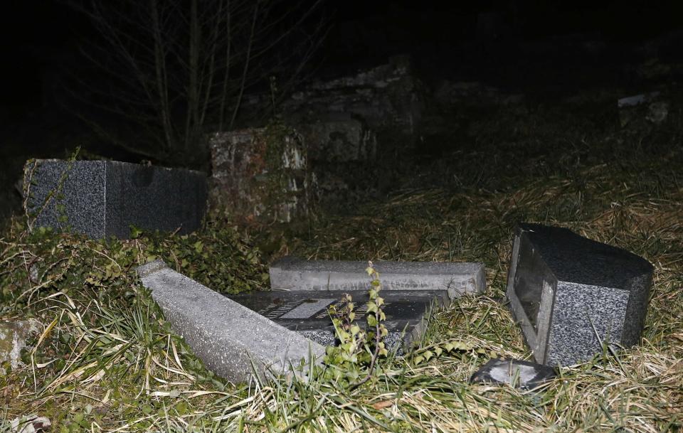 Desecrated tombstones are seen at Sarre-Union Jewish cemetery