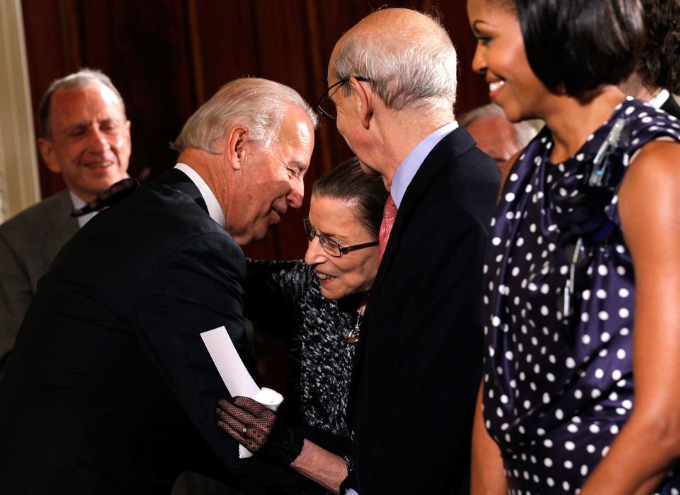 Joe Biden, then the vice president, greets Supreme Justice Bader Ginsburg on May 27, 2010, in the East Room of the White House in Washington, D.C. He called her "a beloved figure." (Alex Wong via Getty Images)