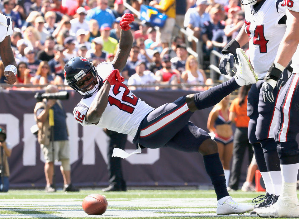 <p>Bruce Ellington #12 of the Houston Texans reacts after catching a touchdown pass during the first quarter of a game against the New England Patriots at Gillette Stadium on September 24, 2017 in Foxboro, Massachusetts. (Photo by Jim Rogash/Getty Images) </p>