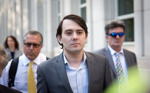 Ex-pharmaceutical executive Martin Shkreli leaves after his appearance at the U.S. District Court f - Credit: Kevin Hagen/Getty