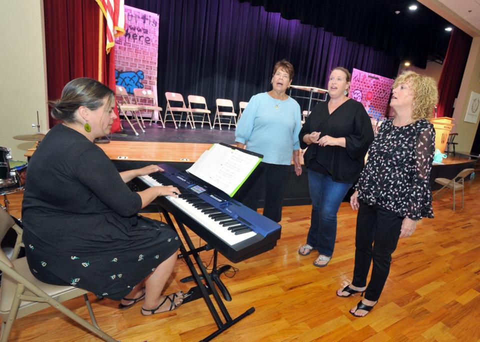 Rehearsing a song for the upcoming JM Productions show that will be presented at the Woodward School in Quincy are, from left, Music Director Sarah Troxler, Sheila Fahey, Jennifer Fahey and Ann Kenneally-Ryan on Thursday, Sept. 15, 2022.