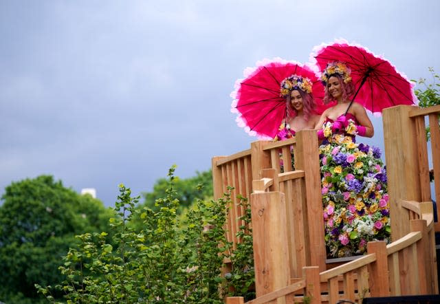 Models wear floral dresses 