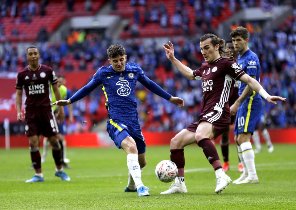 Chelsea's Mason Mount (left) and Leicester City's Caglar Soyuncu battle for the ball during the Emirates FA Cup Final at Wembley Stadium, London.