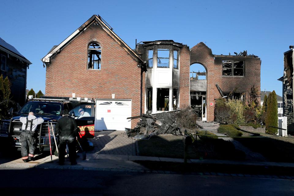 The investigation of a fatal fire at 5 Harvest Way in Little Egg Harbor continues Tuesday, March 7, 2023, the day after the fire destroyed that home and damaged two adjacent ones.  