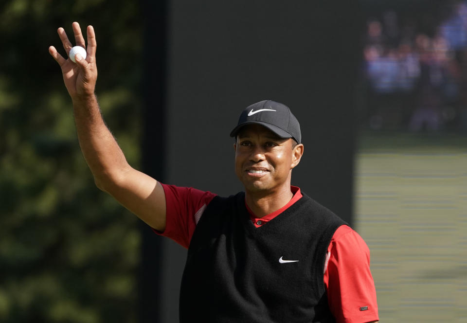 Tiger Woods of the United States reacts after his putt on the 18th hole during the final round of the Zozo Championship PGA Tour at the Accordia Golf Narashino country club in Inzai, east of Tokyo, Japan, Monday, Oct. 28, 2019. (AP Photo/Lee Jin-man)