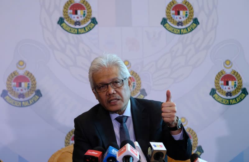 Home Minister  Datuk Seri Hamzah Zainudin speaks during a press conference at the Putrajaya International Convention Centre August 13, 2020. — Bernama pic