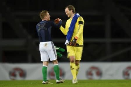 Football Soccer - Northern Ireland v Slovenia - International Friendly - Windsor Park, Belfast, Northern Ireland - 28/3/16 Northern Ireland's Robert Green celebrates with Steven Davis at the end of the match Action Images via Reuters / Tony O'Brien Livepic