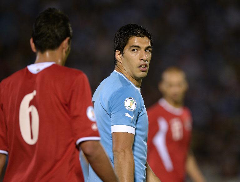 Uruguay's Luis Suarez (C), seen during their Brazil 2014 FIFA World Cup playoffs' second leg match against Jordan, at the Centenario stadium in Montevideo, on November 20, 2013