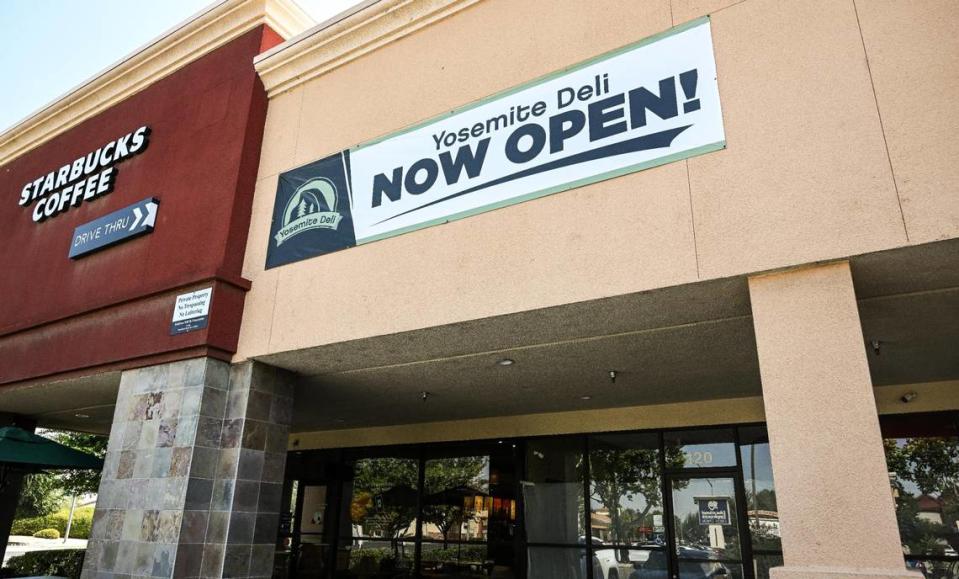 With the “Now open” sign still up, Yosemite Deli has closed. A Mediterranean restaurant is moving into the spot, in the shopping center at Milburn Avenue, south of Herndon Avenue in Fresno, on Thursday, Aug. 31, 2023.