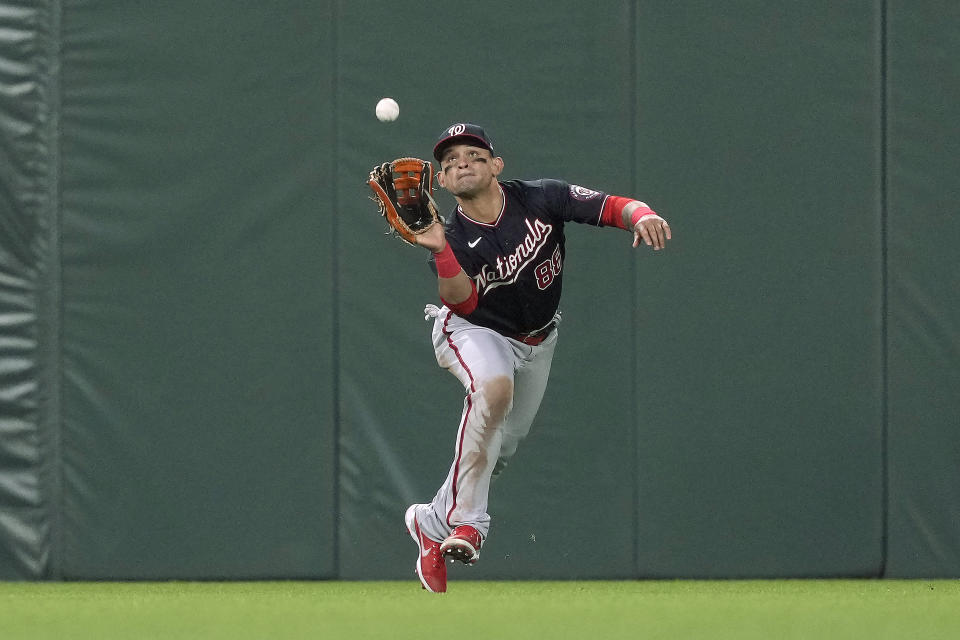 Washington Nationals center fielder Gerardo Parra makes the catch on a fly ball hit by San Francisco Giants' Donovan Solano during the sixth inning of a baseball game Friday, July 9, 2021, in San Francisco. (AP Photo/Tony Avelar)