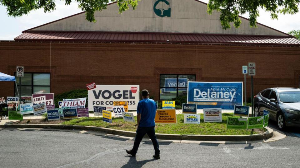 <div>Campaign signs outside a polling station at the Activity Center at Bohrer Park Social Hall in Frederick, Maryland, US, on Tuesday, May 7, 2024. Early voting is underway ahead of Maryland's May 14 primary election, which will determine which Democratic US Senate candidate will take on Republican ex-Governor Larry Hogan, as well as who moves on to the general election in the competitive House race to succeed Democratic Representative David Trone in Maryland's sixth congressional district. Photographer: Graeme Sloan/Bloomberg via Getty Images</div>