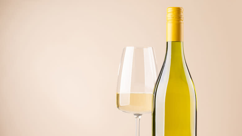 glass and bottle of white wine