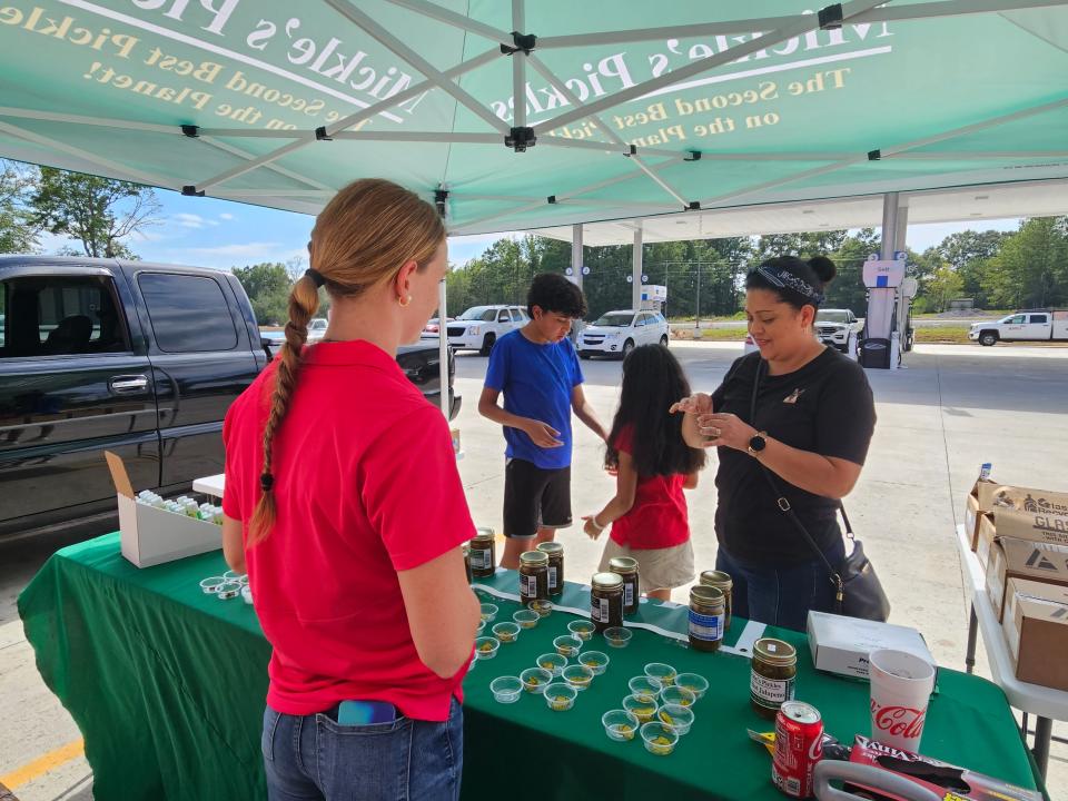 Customers at the new Keith's Superstore near Brooklyn, Miss., got to sample locally made Mickle's Pickles and soon-to-be-released jalapeños, Friday, Sept. 1, 2023.