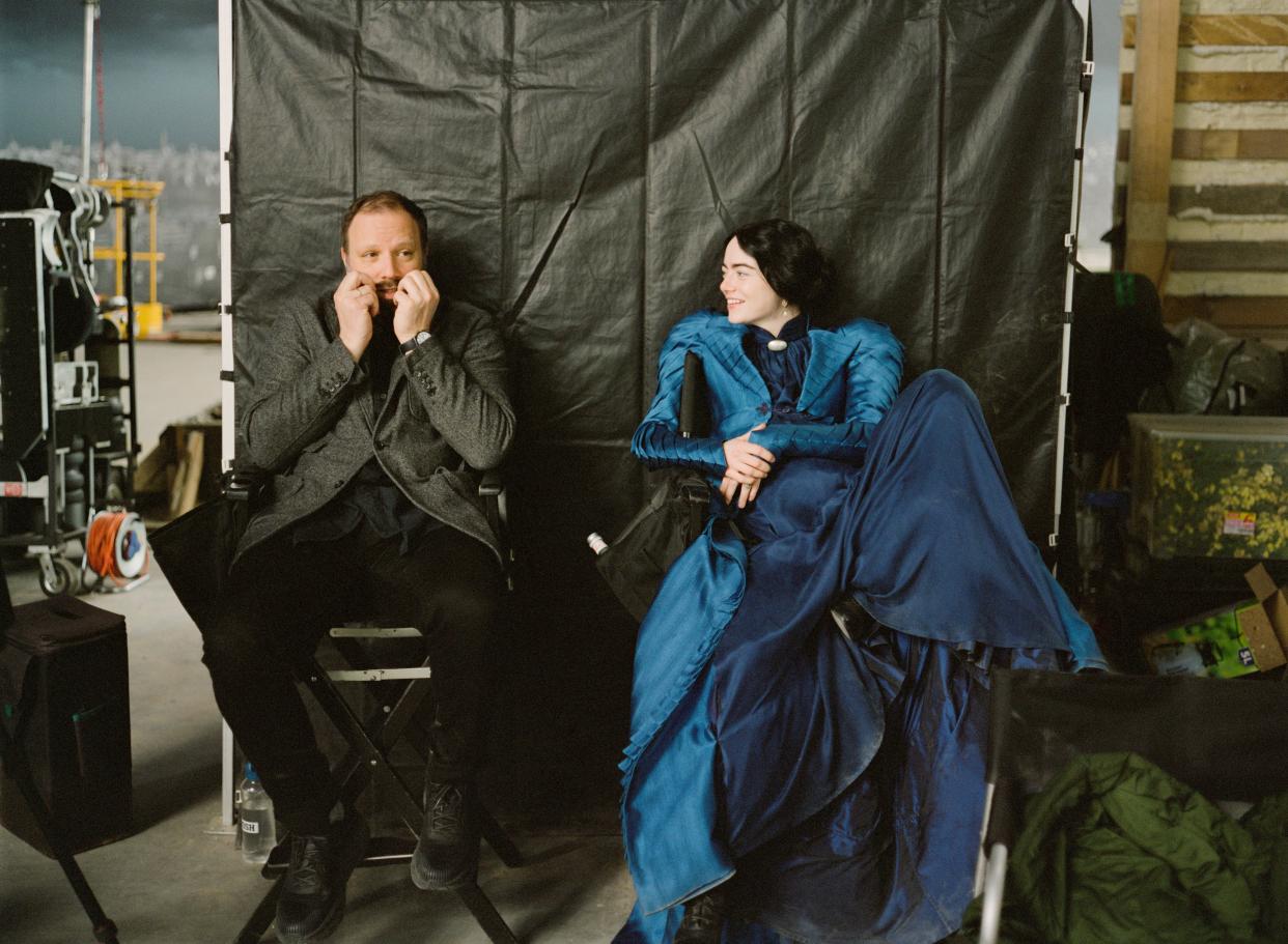 Director Yorgos Lanthimos and Emma Stone take a break on the set of "Poor Things." They've also collaborated on "The Favourite" and upcoming film "Kinds of Kindness."