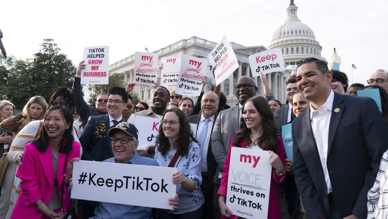 Rep. Jamaal Bowman, D-N.Y., joined at right by Rep. Robert Garcia, D-Calif., rally to defend TikTok and the app’s supporters, at the Capitol in Washington, Wednesday, March 22, 2023. The House holds a hearing Thursday, with TikTok CEO Shou Zi Chew about the platform’s consumer privacy and data security practices and impact on kids.