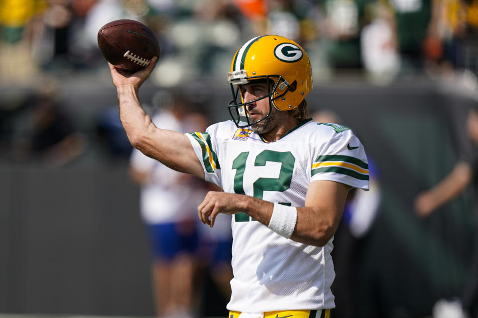 Aaron Rodgers and the Packers edged the Bengals in a wild game. (AP Photo/Bryan Woolston)