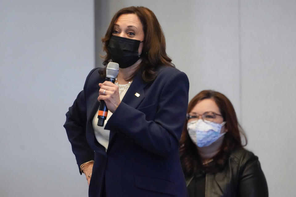 Vice President Kamala Harris speaks during a visit to a COVID-19 vaccination site Tuesday, April 6, 2021, in Chicago, as Sen. Tammy Duckworth, D-Ill., listens. The site is a partnership between the City of Chicago and the Chicago Federation of Labor. (AP Photo/Jacquelyn Martin)