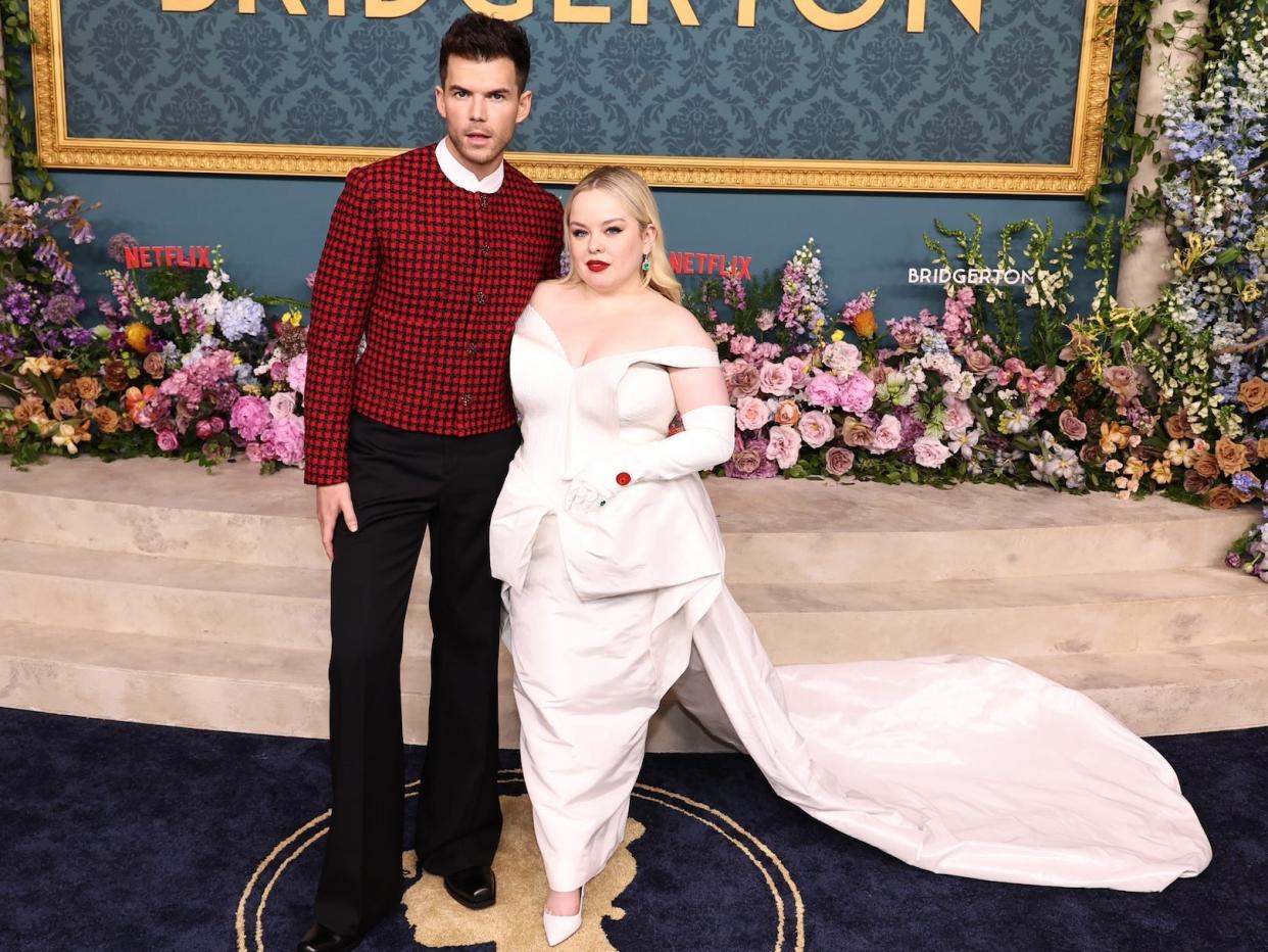 Luke Newton and Nicola Coughlan attend the "Bridgerton" season three world premiere in May 2024.