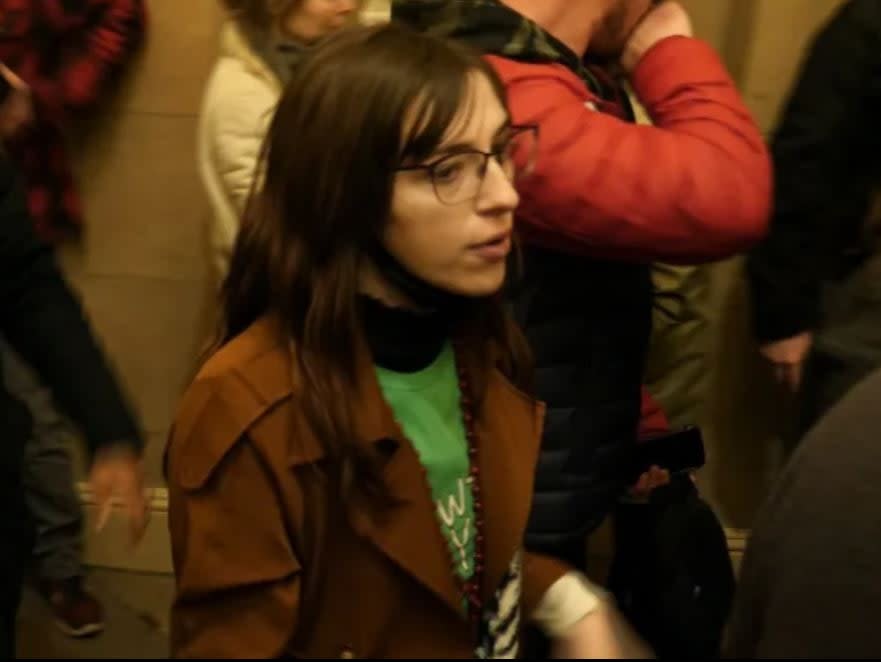 A woman identified as Riley June Williams inside the Capitol building during the riotITV News