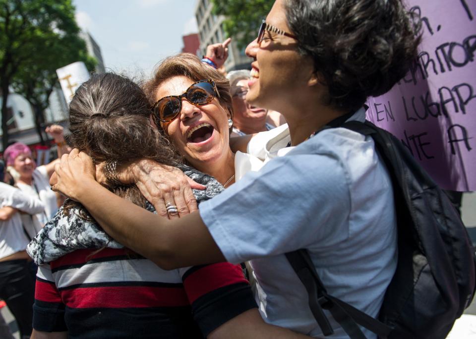 Abortion rights supporters embrace outside Mexico's Supreme Court during a 2016 hearing related to a controversial abortion case in Mexico City. Reproductive rights activists in Mexico have earned incremental victories over the last two decades, culminating in a Sept. 6, 2023, decision by Mexico's Supreme Court ordering the decriminalization of abortion at the federal level.