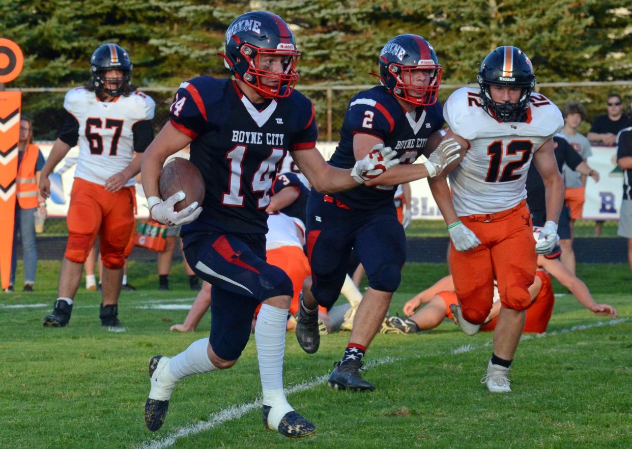 Boyne City's Owen Hewitt got things done as a runner and receiver, while also picking off a pass and leading the team in tackles Thursday night vs. Elk Rapids.