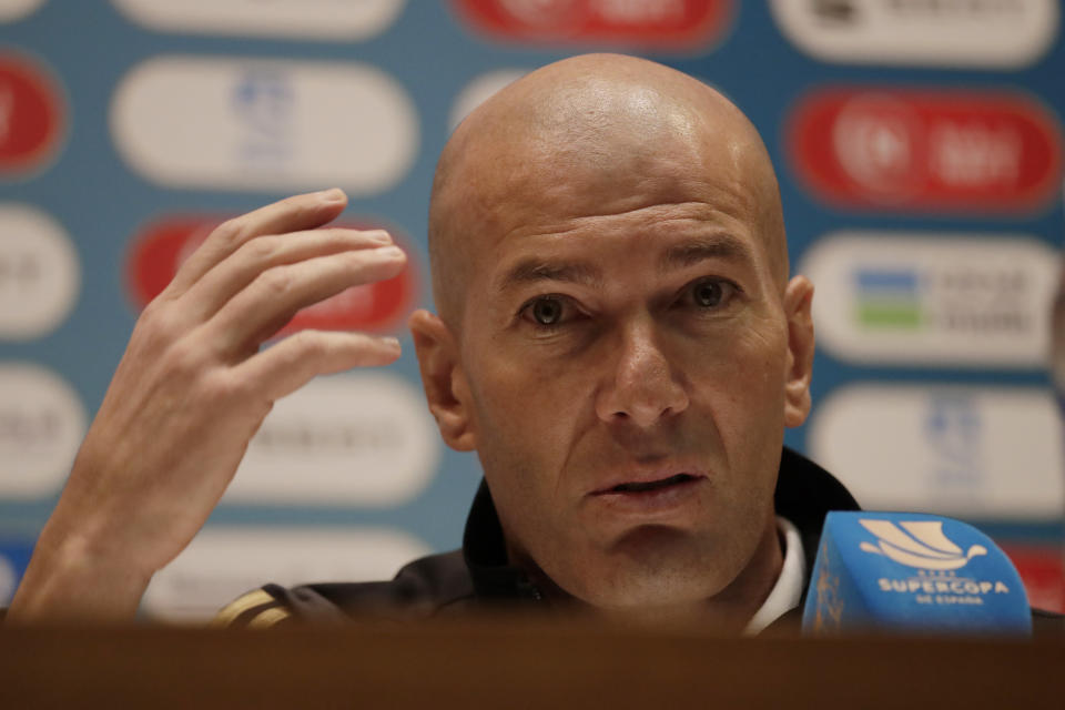 Real Madrid's head coach Zinedine Zidane speaks during a press conference at King Abdullah stadium, in Jiddah, Saudi Arabia, Saturday, Jan. 11, 2020, ahead of the Spanish Super Cup Final soccer match between Real Madrid and Atletico Madrid on Sunday. (AP Photo/Hassan Ammar)