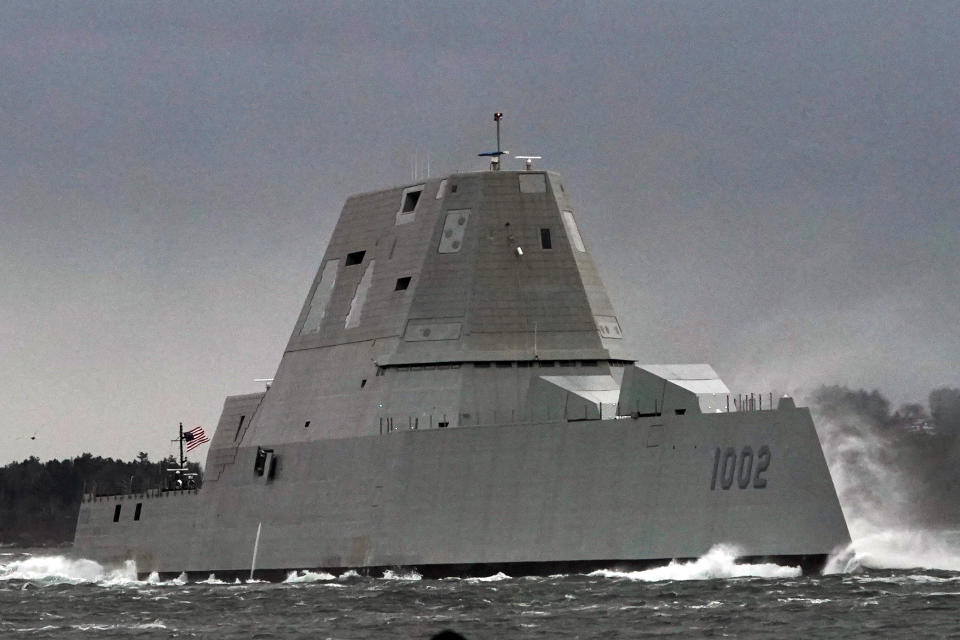 FILE - The Lyndon B. Johnson travels down the Kennebec River on its way to sea, in this Wednesday, Jan. 12, 2022, file photo, in Phippsburg, Maine. The Navy's largest and most expensive destroyers were built around a new gun system that could rapidly fire GPS-guided projectiles more than 50 miles, paving the way for the Marines to storm ashore. But those weapons, rendered useless without ammo, are going to be removed without ever firing a single shot as the Navy rushes to replace them with hypersonic weapons. (AP Photo/Robert F. Bukaty, files)